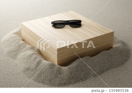 Clean Wooden Block Platform Surrounded by Sand with Sunglasses on Top 135993536