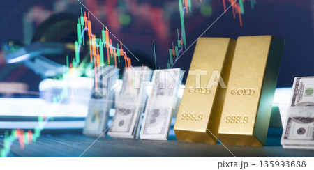 Gold Bullion Bars and US Dollar Cash on Office Desk With Keyboard and Tablet Digital Investment, Commodity Trading, Wealth Management, and Financial Security Concept Gold Bullion Bars and US Dollar Cash on Office Desk With Keyboard and Tablet Digital Investment, Commodity Trading, Wealth Management, and Financial Security Concept 135993688