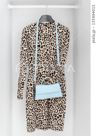 Leopard print dress in minimal wardrobe 135994015