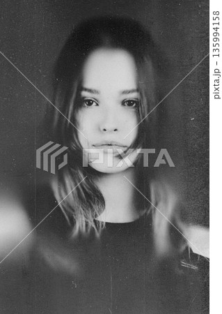 Young woman posing vintage black and white portrait 135994158