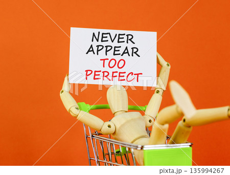 Never appear too perfect symbol. Concept words Never appear too perfect on beautiful white paper. Beautiful orange background. Businessman model. Business never appear too perfect concept. Copy space. Never appear too perfect symbol. Concept words Never appear too perfect on beautiful white paper. Beautiful orange background. Businessman model. Business never appear too perfect concept. Copy space. 135994267