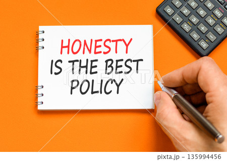 Honesty is the best policy symbol. Concept words Honesty is the best policy on beautiful note. Beautiful orange background. Businessman's hand. Business honesty is the best policy concept. Copy space Honesty is the best policy symbol. Concept words Honesty is the best policy on beautiful note. Beautiful orange background. Businessman's hand. Business honesty is the best policy concept. Copy space 135994456