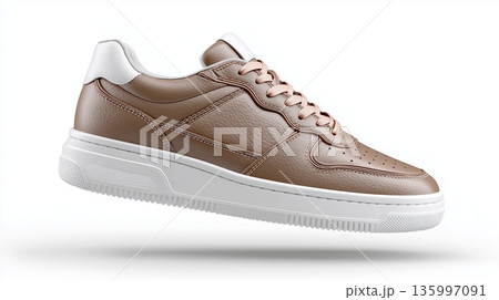 Brown sneaker with white sole shown from side view in neutral background Brown sneaker with white sole shown from side view in neutral background 135997091