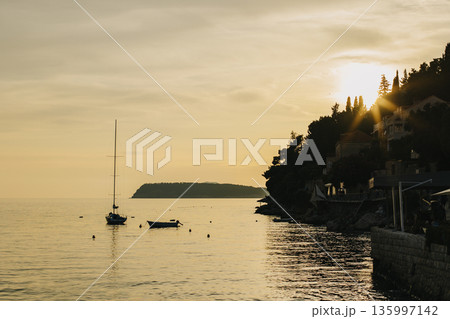 Amazing sunset and the Adriatic sea near Dubrovnik city, Croatia. Travel destination in Croatia. 135997142