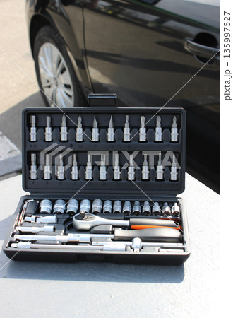 Repair Tools Set In Separate Slots In Plastic Case At Car Workshop Vertical Stock Photo Repair Tools Set In Separate Slots In Plastic Case At Car Workshop Vertical Stock Photo 135997527
