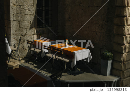 Empty cafe on a street in Dubrovnik old town, Croatia. Travel destination in Croatia. 135998218