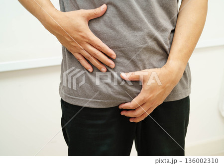 Hernia, Asian man stomach ache, abdominal pain and urology problem health. Hernia, Asian man stomach ache, abdominal pain and urology problem health. 136002310