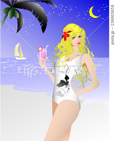 ビーチでカクテルを持つ女性 136003658