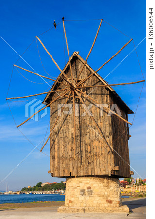 Old wooden windmill in the old town of Nessebar, Bulgaria 136006544