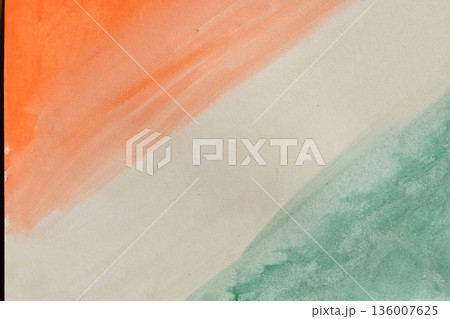 Abstract watercolor brushstrokes of orange and green on a white background, representing the colors of the Indian flag. Festive art, perfect for national holidays. 136007625