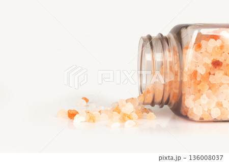 pink salt bottle isolated on white background pile 136008037
