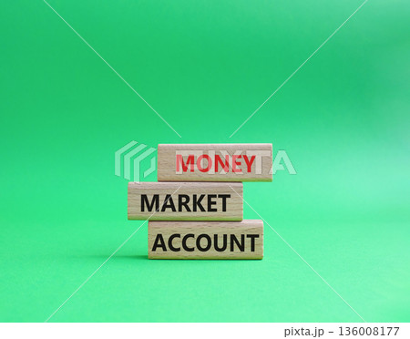 Money Market Account symbol. Wooden blocks with words Money Market Account. Beautiful green background. Business and Money Market Account concept. Copy space. Money Market Account symbol. Wooden blocks with words Money Market Account. Beautiful green background. Business and Money Market Account concept. Copy space. 136008177