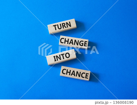 Change and Chance symbol. Concept words Turn Change Into Chance on wooden blocks. Beautiful bright blue background. Business and Turn Change Into Chance concept. Copy space. Change and Chance symbol. Concept words Turn Change Into Chance on wooden blocks. Beautiful bright blue background. Business and Turn Change Into Chance concept. Copy space. 136008190