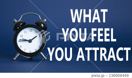 What you Feel you Attract you symbol. Wooden blocks with words What you Feel you Attract. Beautiful deep blue background with alarm clock. Business and What you Feel you Attract concept. Copy space. What you Feel you Attract you symbol. Wooden blocks with words What you Feel you Attract. Beautiful deep blue background with alarm clock. Business and What you Feel you Attract concept. Copy space. 136008489
