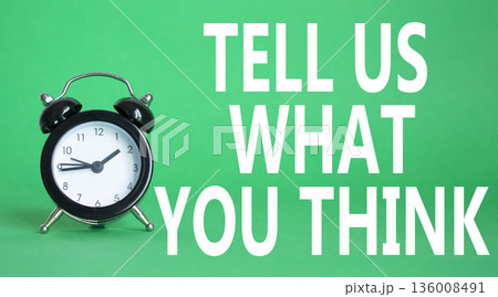 Tell us what you think symbol. Wooden blocks with words Tell us what you think. Beautiful green background with alarm clock. Business and Tell us what you think concept. Copy space. Tell us what you think symbol. Wooden blocks with words Tell us what you think. Beautiful green background with alarm clock. Business and Tell us what you think concept. Copy space. 136008491