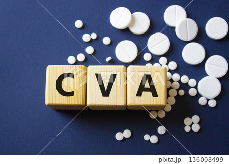 CVA symbol. Wooden cubes with words CVA Cerebrovascular accident. Beautiful deep blue background. Healthcare and Cerebrovascular accident concept. Copy space. CVA symbol. Wooden cubes with words CVA Cerebrovascular accident. Beautiful deep blue background. Healthcare and Cerebrovascular accident concept. Copy space. 136008499
