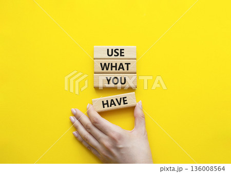 Use what you Have symbol. Concept words Use what you Have on wooden blocks. Beautiful bright yellow background. Businessman hand. Business and Use what you Have concept. Copy space. Use what you Have symbol. Concept words Use what you Have on wooden blocks. Beautiful bright yellow background. Businessman hand. Business and Use what you Have concept. Copy space. 136008564