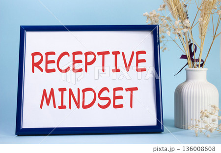 Receptive Mindset symbol. Concept words Receptive Mindset on beautiful wooden picture frame. Beautiful light blue background with flower vase. Business and Receptive Mindset concept. Copy space. Receptive Mindset symbol. Concept words Receptive Mindset on beautiful wooden picture frame. Beautiful light blue background with flower vase. Business and Receptive Mindset concept. Copy space. 136008608