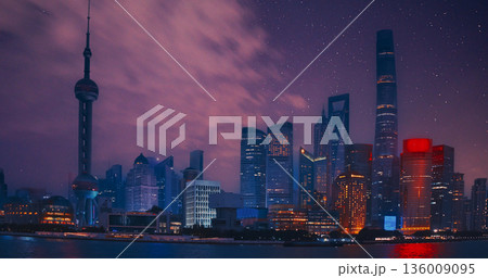 Night starry sky above Shanghai Skyscrapers. reflection of Shanghai's skyscrapers amidst bustling urban life at evening. Night starry sky above Shanghai Skyscrapers. reflection of Shanghai's skyscrapers amidst bustling urban life at evening. 136009095