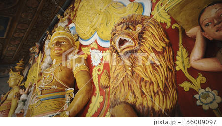 Intricate Carvings of Deities and Lion in Temple Intricate Carvings of Deities and Lion in Temple 136009097