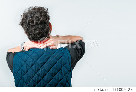Concept of people with stress and neck pain. Close up of person with neck pain 136009128