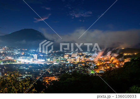 Beppu town with motion steam of hot spring and stars at night , Oita 136010033