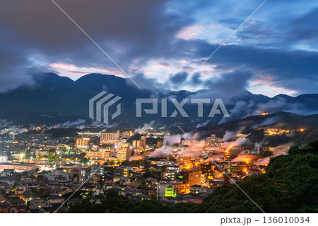 Aerial view of Beppu town valley in bath houses at dusk 136010034