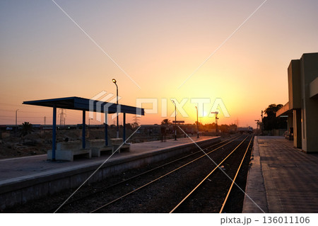 Empty railway platform at sunset Empty railway platform at sunset 136011106