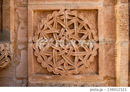 Intricate stone geometric ornament carved in historic architecture 136012321