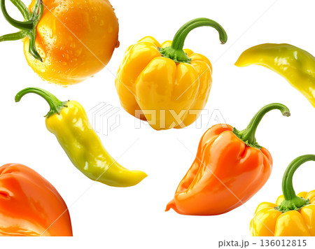 Fresh yellow and orange peppers with a dewy yellow tomato, isolated on white background, concept of healthy organic food 136012815