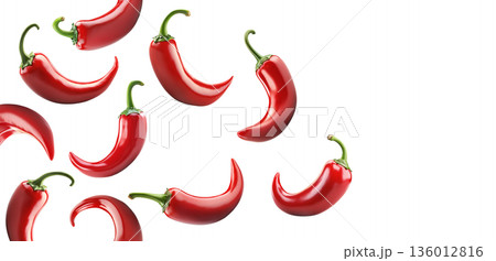 Red chili peppers arranged, isolated on white background, concept of spicy cooking ingredient 136012816