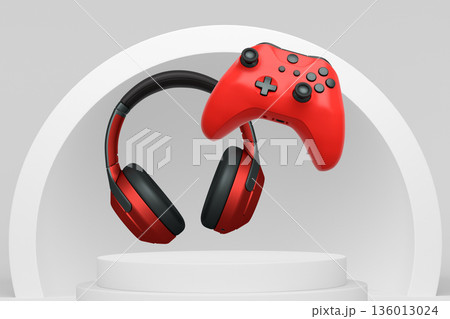 Wireless gaming controller and headphones displayed over podium on abstract background, concept of modern gaming technology 136013024