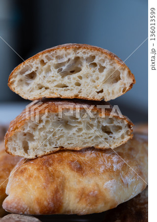 Freshly Baked Bread With a Soft Inside and Crispy Crust on Display in a Kitchen Setting 136013599