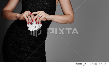 Graceful Lady Dressed For Evening Gaming. Elegant Woman In Sequined Attire Adopts Serious Poker Stance. Sophisticated Lady Donning Evening Gown Maintains Tense Poker Posture During Game Graceful Lady Dressed For Evening Gaming. Elegant Woman In Sequined Attire Adopts Serious Poker Stance. Sophisticated Lady Donning Evening Gown Maintains Tense Poker Posture During Game 136014503