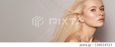 CloseUp Blonde Model With Dewy Skin, Neutral Backdrop, Windblown Hair, Subtle Makeup, Luminous Cheek Highlights, Minimalist Studio Lighting, Serene Expression, Beauty Campaign Mood, Clean Commercial CloseUp Blonde Model With Dewy Skin, Neutral Backdrop, Windblown Hair, Subtle Makeup, Luminous Cheek Highlights, Minimalist Studio Lighting, Serene Expression, Beauty Campaign Mood, Clean Commercial 136014513