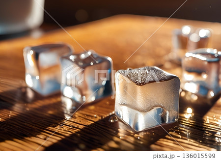 Reusable stainless steel ice cubes chilling drinks without dilution. AI Generated Reusable stainless steel ice cubes chilling drinks without dilution. AI Generated 136015599