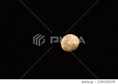 yellow half moon shining floating on sky in night  136016529