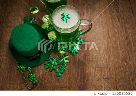 St. Patrick's day celebration with green beer and shamrocks St. Patrick's day celebration with green beer and shamrocks 136016586