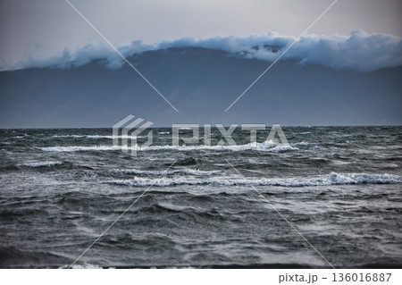 the sea under the mountain on a summer day Vlora, Albania, photographed on August 2025. the sea under the mountain on a summer day Vlora, Albania, photographed on August 2025. 136016887