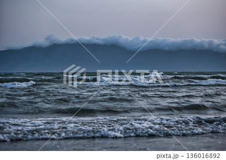 the sea under the mountain on a summer day Vlora, Albania, photographed on August 2025. the sea under the mountain on a summer day Vlora, Albania, photographed on August 2025. 136016892