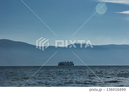 the sea under the mountain on a summer day Vlora, Albania, photographed on August 2025. 136016899