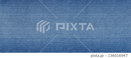 Blue denim textile showing a material pattern Blue denim textile showing a material pattern 136016947