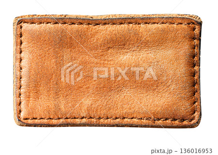 Blank brown leather clothing label with stitching 136016953