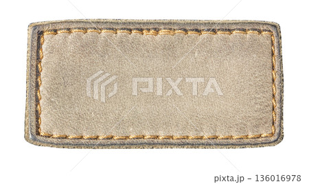 Blank brown leather tag with stitching on transparent background 136016978