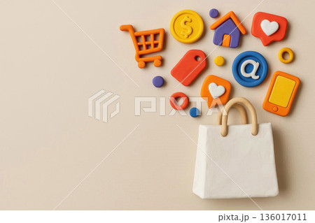White bag with plasticine online shopping icons. Space for text. White bag with plasticine online shopping icons. Space for text. 136017011