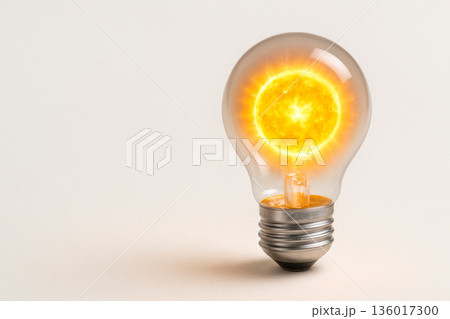 A light bulb with the sun inside. Space for text. A light bulb with the sun inside. Space for text. 136017300