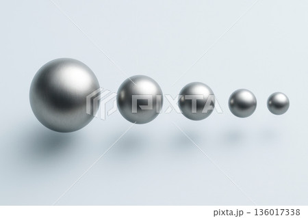 A row of metal balls floating in space. Space for text. A row of metal balls floating in space. Space for text. 136017338