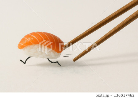 Sushi runs away from the sticks. Space for text. 136017462