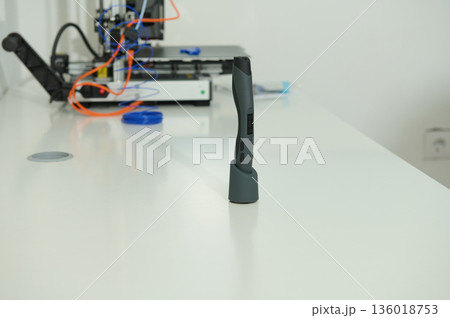 Handheld Lab Device On White Lab Bench With Background Equipment Handheld Lab Device On White Lab Bench With Background Equipment 136018753