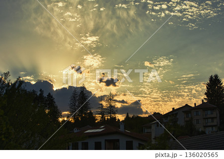 Soft golden sunset clouds over August 2025, with a lone bird gliding across the sky in a peaceful minimalistic scene. Soft golden sunset clouds over August 2025, with a lone bird gliding across the sky in a peaceful minimalistic scene. 136020565